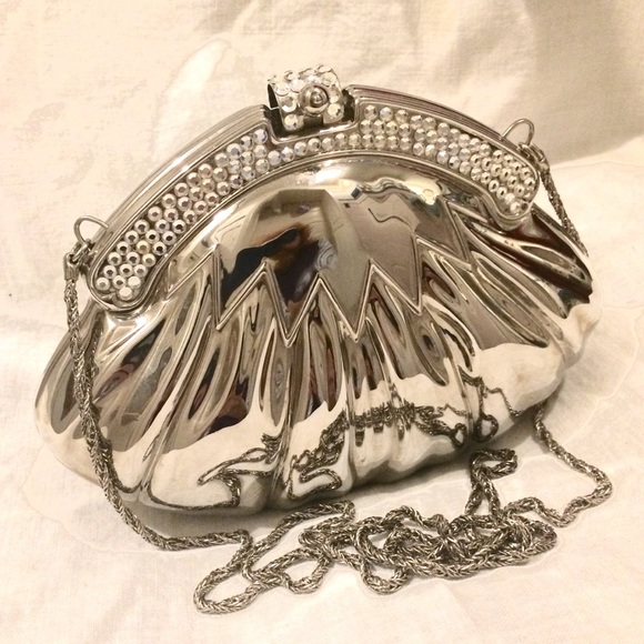 Sasha Handbags - Silver clutch with rhinestones.